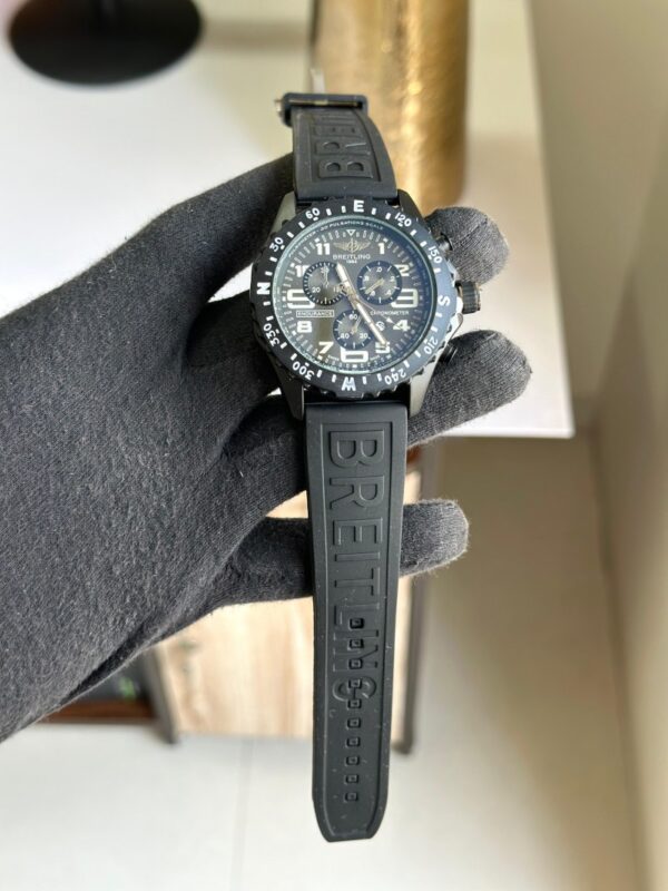 A beautiful and affordable Black Breitling casual wristwatch featuring a unique large metal dial and a sporty loop strap. Comes with a free box and cufflinks. - Image 4